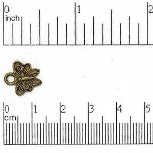 13mm x 12mm Ornate Butterfly Charm - Made of plated pewter - Sold individually - CBS1587