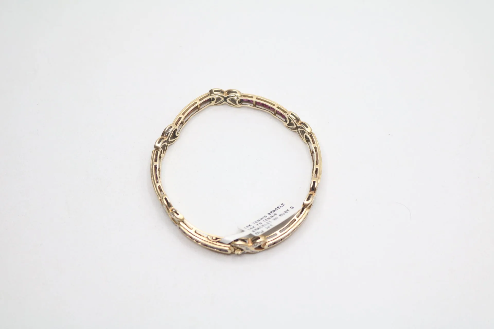 14K Yellow Gold Diamond and Ruby Bracelet (Rubies 4.20 CTW) (Diamonds 0.20 CTW) (Local pick-up Only)