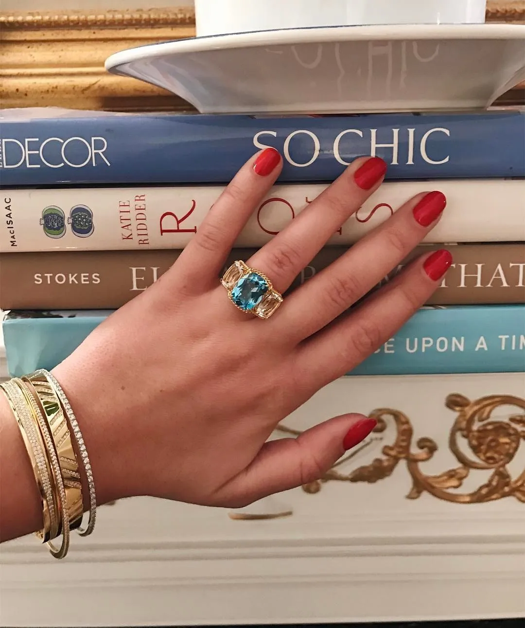 Elegant Three Stone Garnet Ring with Gold Rope Twist Border