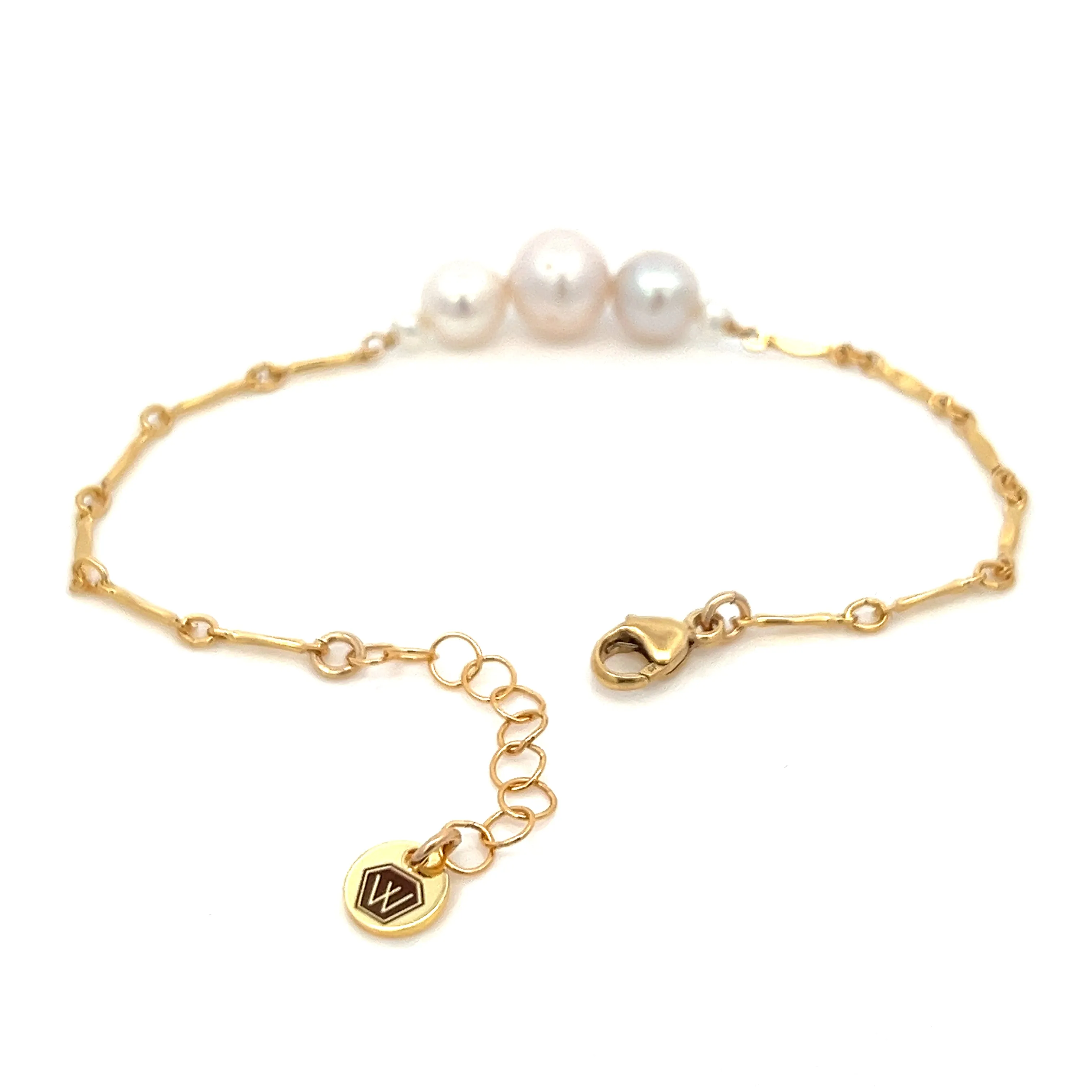 graduated five-pearl and gold bar bracelet