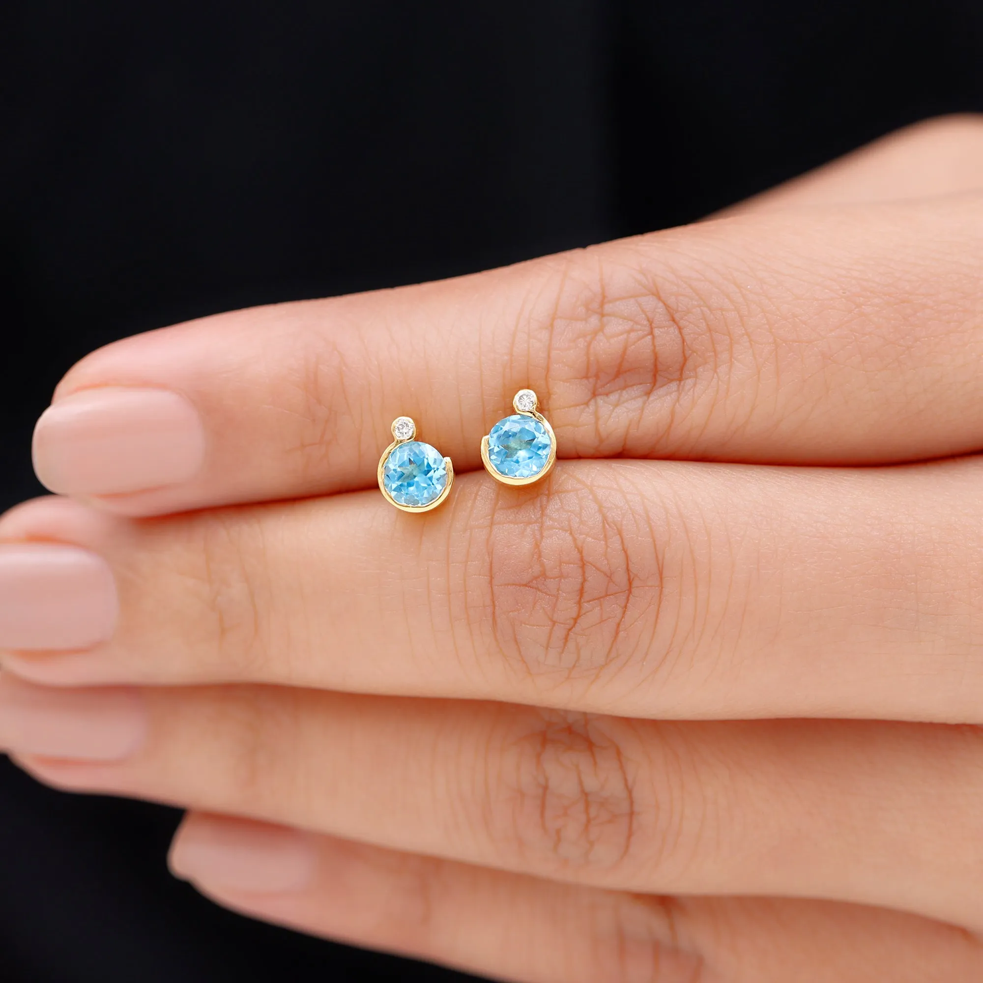 Round Swiss Blue Topaz Stud Earrings with Moissanite