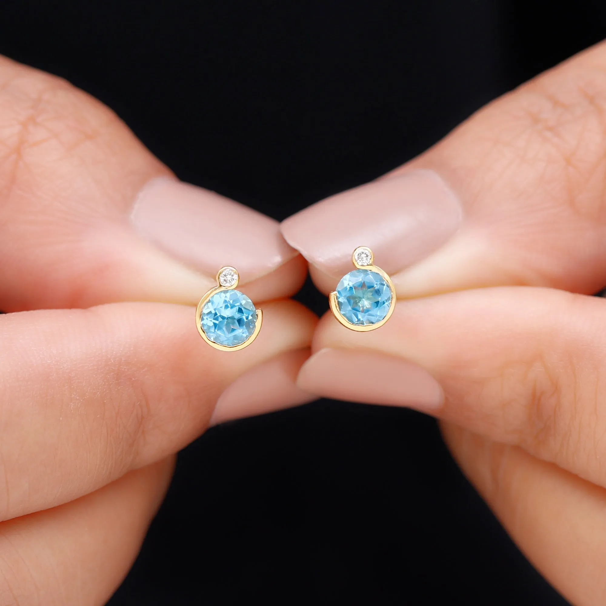Round Swiss Blue Topaz Stud Earrings with Moissanite