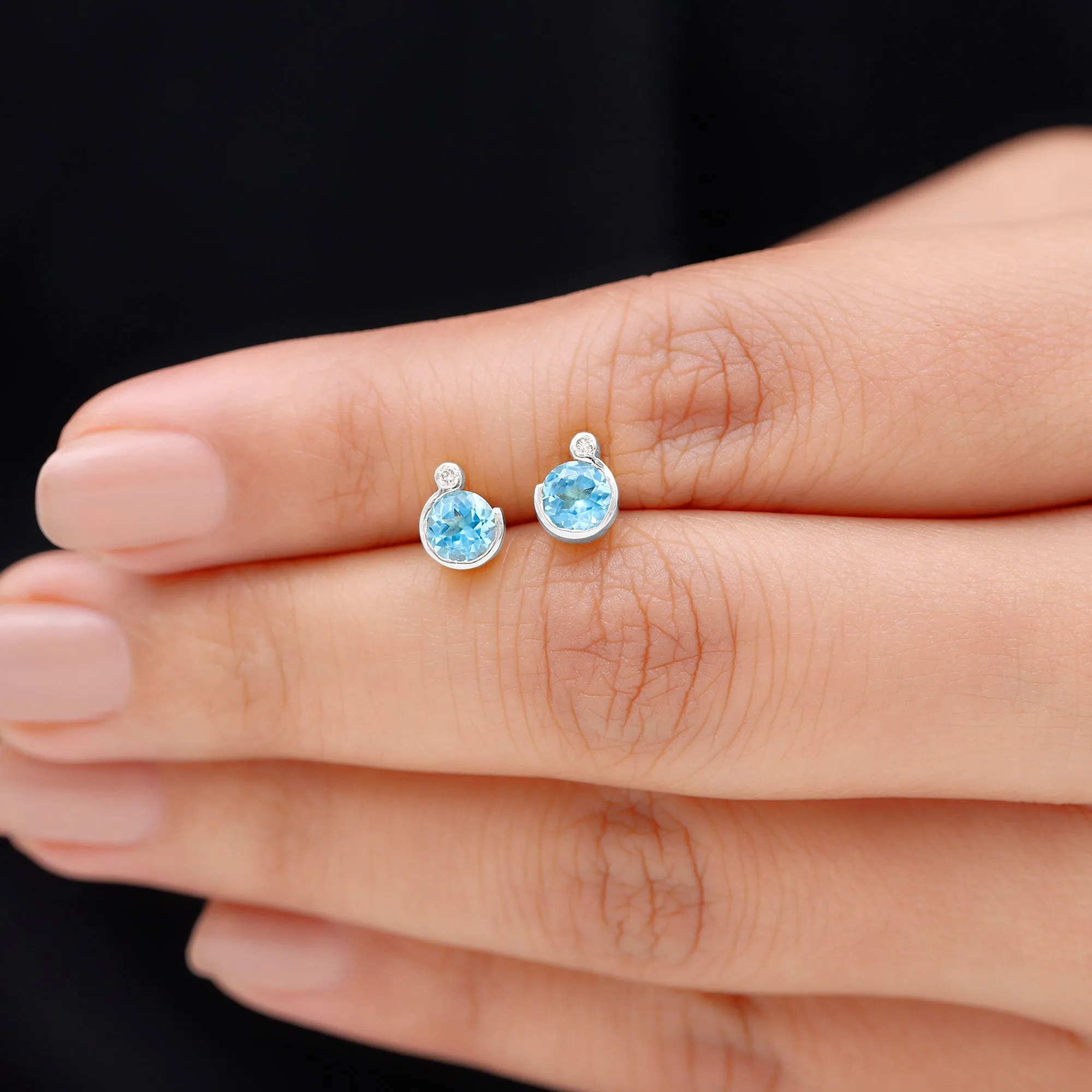 Round Swiss Blue Topaz Stud Earrings with Moissanite